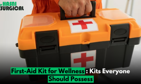 A Man holding a medical first aid box.