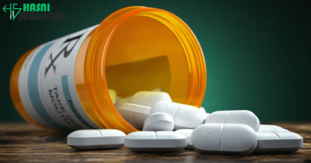 A prescription medication pill box lying on a table, and pills spilling out.