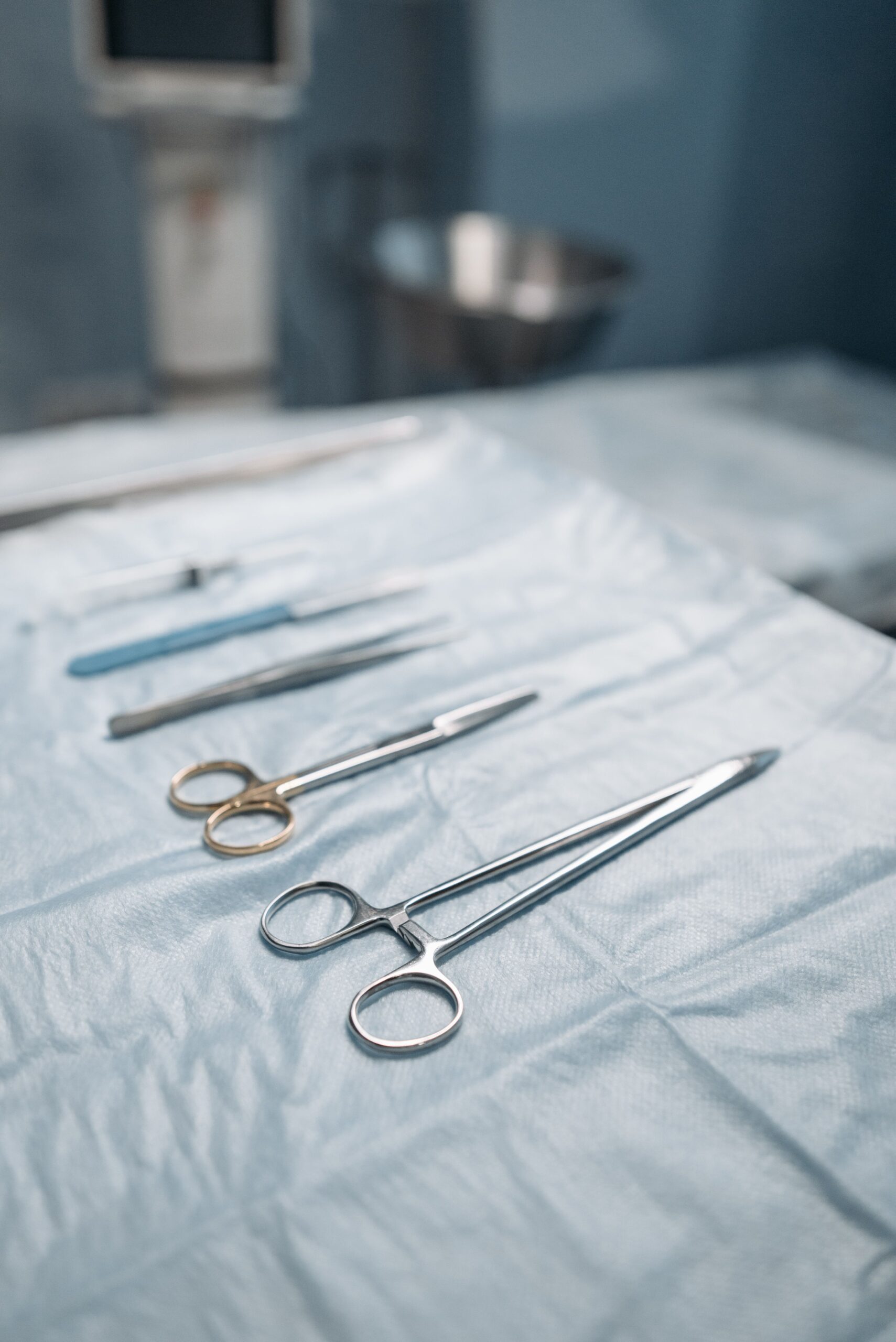 Sterile surgical instruments arranged on operating room table - thinning scissors maintenance